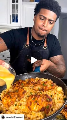 a man in an apron is cooking food on the stove and he is looking at the camera