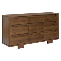 a large wooden dresser with six drawers