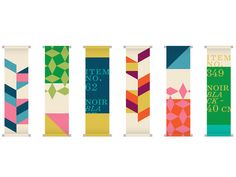 an assortment of colorful banners with numbers and designs on them, all in different colors