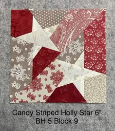 the candy striped holly star 6 block is made with red, white and grey fabrics