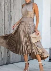 Bronzed Beauty Pleated Midi Dress – Mota Boutique Luxury Pleated Sleeve Mini Dress For Evening, Luxury Flowy Dress With Smocked Bodice, Luxury Feminine Pleated Dress For Formal Occasions, Luxury Fit And Flare Midi Dress With Pleated Back, Luxury Flowy Dress With Pleated Bodice, Luxury Sleeveless Pleated Dress For Party, Luxury Flowy Midi Dress For Date Night, Luxury Pleated Mini Dress For Formal Occasions, Luxury Sleeveless Satin Dress With Pleated Bodice