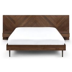 a bed with a wooden headboard and white sheets on top of it, against a white background