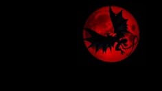 a red moon with a black dragon on it