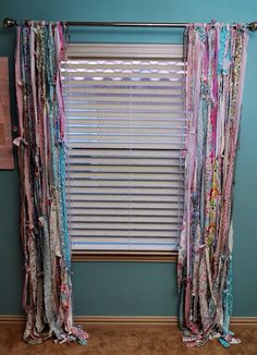 the window is covered with colorful fabric