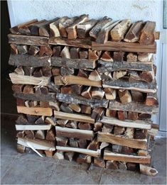 a pile of wood sitting on top of a floor