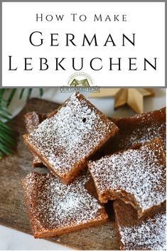 the recipe for german lebkuchen on a cutting board with powdered sugar