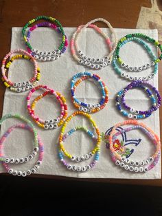 a bunch of bracelets that are sitting on a table