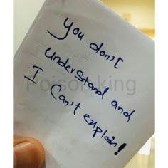 a hand holding a piece of paper with writing on it that says, you don't understand i can't explain