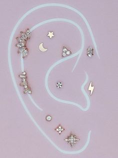 a pink background with several different types of earrings on top of one another and the letter s in the middle