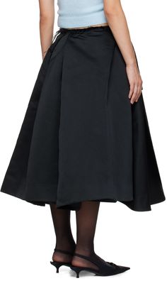 Polyester satin midi skirt. Pleats throughout. · Wrap construction · Frayed edge at waistband · Self-tie drawstring at waistband and interior · Asymmetrical hem Supplier color: Black Shushu Tong, Shushu Tong Skirt, Black Asymmetrical Gathered Skirt, Voluminous Midi-length Gathered Skirt, Luxury Black Midi-length Pleated Skirt, Satin Midi Skirt, Polyester Satin, Pleated Midi Skirt, Asymmetric Hem