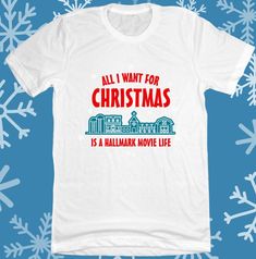 a white t - shirt that says all i want for christmas is a mallark move life