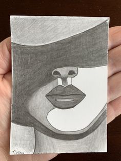 a drawing of a woman's face with a hat on her head is shown