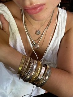 bangles jewlery inspo mixed metals vintage jewlery layered necklaces Mixing Metals Jewelry Aesthetic, Necklace Stacks Aesthetic, Stacking Bangles, Gold Vintage Necklace Aesthetic, Gold Jewelry Antique, Mixed Metals Jewelry Aesthetic, Gold Silver Jewelry, Lots Of Gold Jewelry Aesthetic