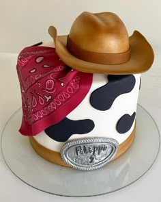 a cowgirl cake with a cowboy hat on top