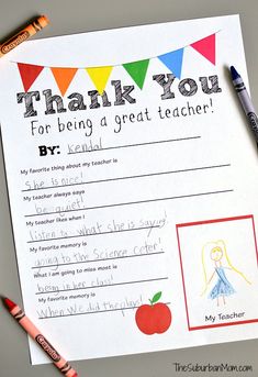 a thank card with an apple and pencils next to it on top of a table