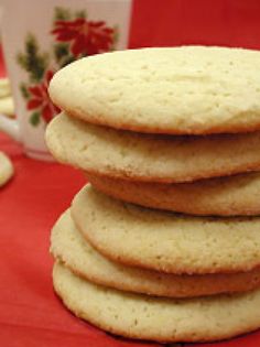 a stack of cookies sitting on top of a red table