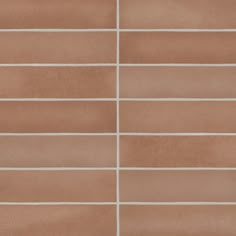 a brown tile wall with white lines on the bottom and one line in the middle