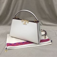 New Leather Tory Burch Eleanor Spazzolato Satchel Bag Portable Shoulder Bag . Very Stylish Bag, Good Value For Money. The Approx: 321222cm Color: Off White This Handbag Has An Adjustable Shoulder Strap. Wide Range Of Uses Brand New, Unused, With Dust Bag, Label. Welcome To Share And Offer . Thank You Shop With Me. Any Questions Pls Dont' Hesitate And Let Me Know.Tks. Designer Tan Bags With Detachable Handle, Designer Tan Bag With Detachable Handle, Designer Tan Top Handle Bag, Luxury Tan Crossbody Bags, Designer Tan Shoulder Bag, Luxury Tan Handheld Bag, Luxury Tan Bags With Top Carry Handle, Luxury Tan Bag With Top Carry Handle, High-end White Handheld Shoulder Bag