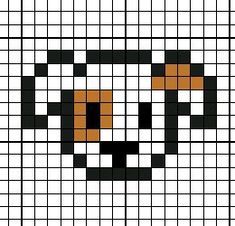 a cross stitch pattern with an orange and black cat's face