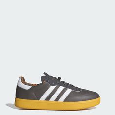 the adidas sneakers in grey and yellow