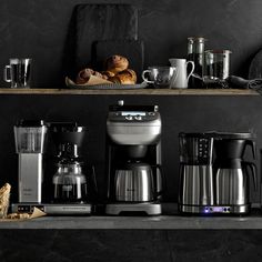 there are many different types of coffee maker on the shelf