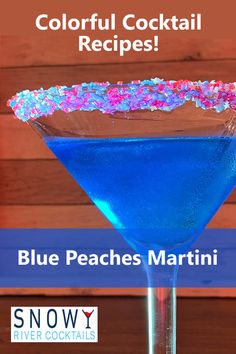 a blue cocktail with sprinkles on the rim