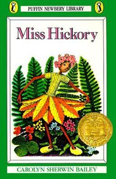 the book miss hickory is in front of a white background with an orange and yellow flower