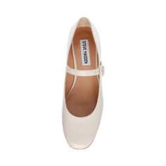 Steve Madden Women's Heels | SESSILY Bone Patent Make it a mary-jane! SESSILY is the perfect beige ballet heel. Crafted with a low block heel for a touch of height, this tonal low heel is perfect for day to day wear. The buckle closure adds a coquette touch to the classy almond toe, just add socks! Synthetic patent upper material Synthetic lining and sole Top strap with buckle closure 1.5" heel height Loafers Trend, Ballet Heels, Monochrome Design, Patent Heels, Trainer Heels, Business Shoes, Loafer Mules, Low Block Heels, Women's Heels