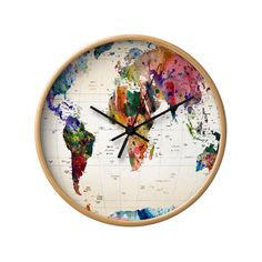 a wall clock with the world map painted on it's face, showing different colors