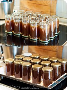 there are many jars filled with food on the stove and one has chocolate in it