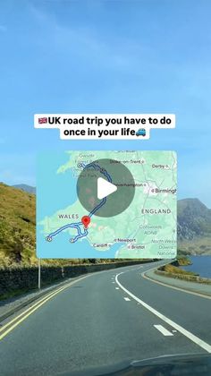 a road with a sign that says uk road trip you have to do once in your life