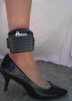 a woman's foot with an ankle brace attached to it