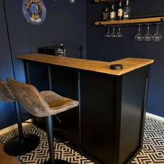 a bar with two stools in front of it