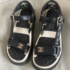 Lambskin And Patent Leather From 2022 Collection Great Condition - Will Look Brand New If Cleaned Properly Chanel Logo On Inside Is Worn But This Happens With All Their Shoes Comes With Original Box And Dust Bags Classic Dad Sandal Chanel Jesus Sandals, Chanel Sandals Cheap, Black And White Chanel Sneakers, White Chanel Bag, Chanel Quilted Sandals, Chanel Black Quilted Flats, Dad Sandals, Chanel Sandals, Shoes Chanel