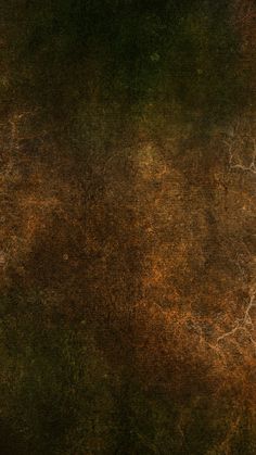 an old grungy textured background in brown and green