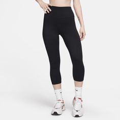 Up for a workout or down to chill, these leggings are the Ones that are ready for whatever you are. Their midweight, peachy-soft fabric stretches with your every move and dries quickly. Plus, a high waist is designed to meet your favorite cropped tops for a head-to-toe look that you can feel confident and comfortable in all day long. Sporty Tight Hip-length Activewear, Functional Stretch Hip-length Activewear, Nike Elastane Yoga Bottoms, Sporty Hip-length Leggings For Pilates, Sporty Compressive Tights, Casual Nike Yoga Pants, Functional Nike Gym Bottoms, Nike Functional Gym Bottoms, Tight Hip-length Athleisure Activewear