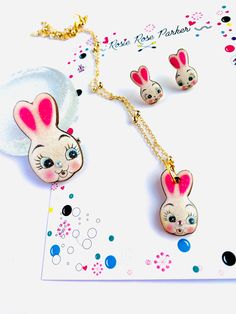 Hop into Easter with this playful bunny necklace by Rosie Rose Parker. With its cute and kitschy charm, celebrate the holiday in style. Perfect for adding a touch of quirky fun to your outfit. Quirky Pink Jewelry Gift, Easter Gifts For Adults, Easter Bunny Cartoon, Easter Gift For Adults, Easter Bunny Earrings, Bunny Necklace, Rabbit Necklaces, Bunny Cartoon, Easter Jewelry