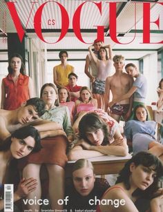 a group of people laying on top of each other in front of a magazine cover