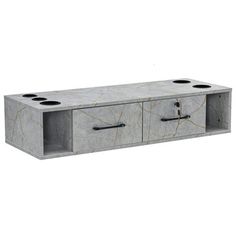 a gray marble cabinet with three black handles