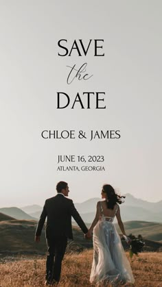 a couple holding hands while walking through the grass with mountains in the background and text that says save the date