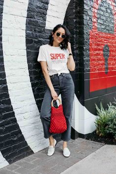 Fashion blogger Lilly Beltran wearing a graphic tee with black high waisted jeans and white studded loafers. #casualoutfit #streetstyle Studded Loafers Outfit, High Waisted Black Jeans, Trending Graphic Tees, Graphic Tee Outfits, Current Fashion Trends, Weekend Outfit, Affordable Clothes, Basic Outfits