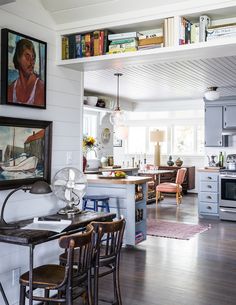 the kitchen is clean and ready to be used as a dining room or living room