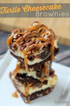 three brownies stacked on top of each other with chocolate and caramel drizzle