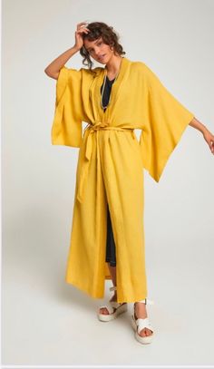 Special design oversize pure Italian linen kimono Simple and beautiful SPECIFICATION * Fabric: 100 % Linen * Color : mustard yellow, natural brown * Size : This Kimono is standard size perfectly suits all sizes. Small, Medium, Large, xlarge it fits all sizes in a perfect way. Bust: 52 inches/132 cm Length: 56 inches/142 cm CARE INSTRUCTION * Machine Wash Warm and Seperately * Do Not Tumble Dry * Iron inside out and Warm * Do Not Bleach The link for a beautiful gift box is below; https://www.etsy Long Linen Kimono For Summer, Long Linen Kimono For Beach, Oversized Open Front Kimono For Daywear, Linen Kimono With Kimono Sleeves For Vacation, Long Linen Robe For Spring, Yellow Wrap Kimono For Spring, Oversized Robe With Kimono Sleeves For Daywear, Linen Wrap Kimono For Vacation, Long Linen Summer Robe