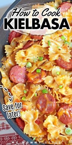 a skillet filled with pasta and sausage