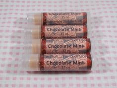 This Chocolate Mint Flavored Lip Balm is made from some of the best natural ingredients. It is so smooth and creamy. This balm goes on completely clear and melts into your lips leaving wonderful moisture and super soft lips, it feels so good.   We only use the best ingredients available in our lip balms like organic coconut oil, cocoa butter, beeswax, nourishing oils and flavor oils.  We never add petroleum products or harmful ingredients to keep our lip balm natural and most importantly moisturizing so that they will never leave your lips feeling dry.  All of the oils that go into our lip balms have amazing benefits and will keep your lips feeling amazing.   This Lip Balms Ingredients Are: Beeswax, Coconut Oil, Cocoa Butter, Sunflower Oil, Vitamin E, Flavor Oil, Stevia  All of my lip balm Lip Balm Ingredients, Handmade Lip Balm, Flavored Lip Balm, Flavored Oils, Chocolate Mint, Natural Lip Balm, Natural Lip, Soft Lips, Lip Balms