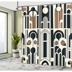 a shower curtain with an art deco design on the front and back panels in black, brown, beige and white