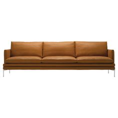 a brown leather couch with chrome legs