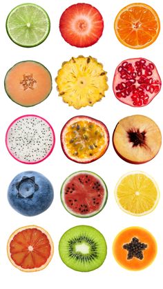 various fruits cut in half on a white background