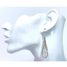 Discover the perfect blend of elegance and style with our Double Hoop Teardrop Earrings – a remarkable accessory that embodies sophistication and uniqueness. These statement teardrop earrings are a true embodiment of minimalist luxury, featuring a distinctive double hoop design that adds a contemporary twist to a classic silhouette. Crafted with meticulous attention to detail, these earrings are a must-have for women who appreciate refined fashion. Crafted from hypoallergenic materials, these do Luxury Everyday Teardrop Jewelry, Elegant Silver Teardrop Wrap Earrings, Modern Metal Teardrop Earrings For Pierced Ears, Classic Metal Teardrop Earrings For Everyday, Minimalist Teardrop Earrings For Party, Chic Teardrop Metal Jewelry, Modern Hypoallergenic Teardrop Jewelry, Teardrop Linear Earrings For Party, Elegant Pierced Teardrop Linear Earrings